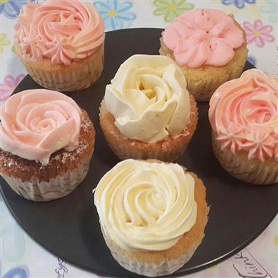 Cream and paper cupcakes