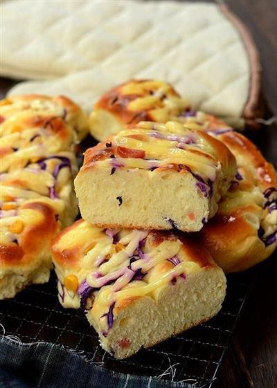 A small loaf of bread with a mixture of vegetables