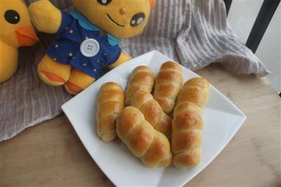 Sausage rolls and bread