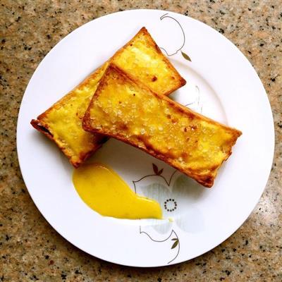 Carrot, garlic, and egg yolk bread