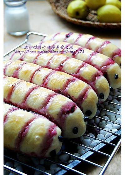 Caterpillar bread with blueberry sauce