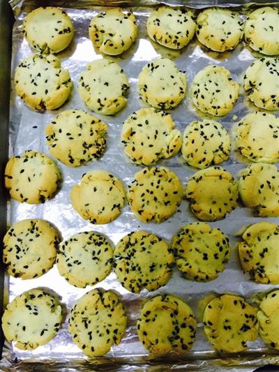 The biscuits are full of black sesame seeds.