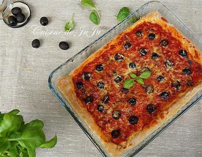 Homemade tomato and olive pizza