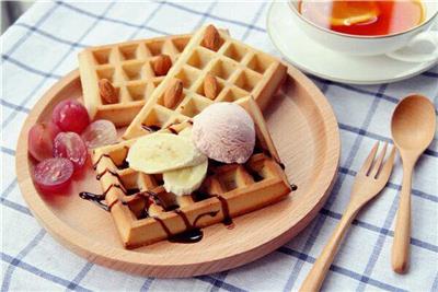 Warm afternoon tea with waffles